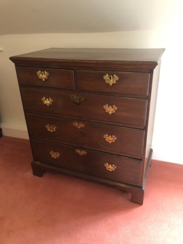 Appraisal: A George III oak chest of two short and three