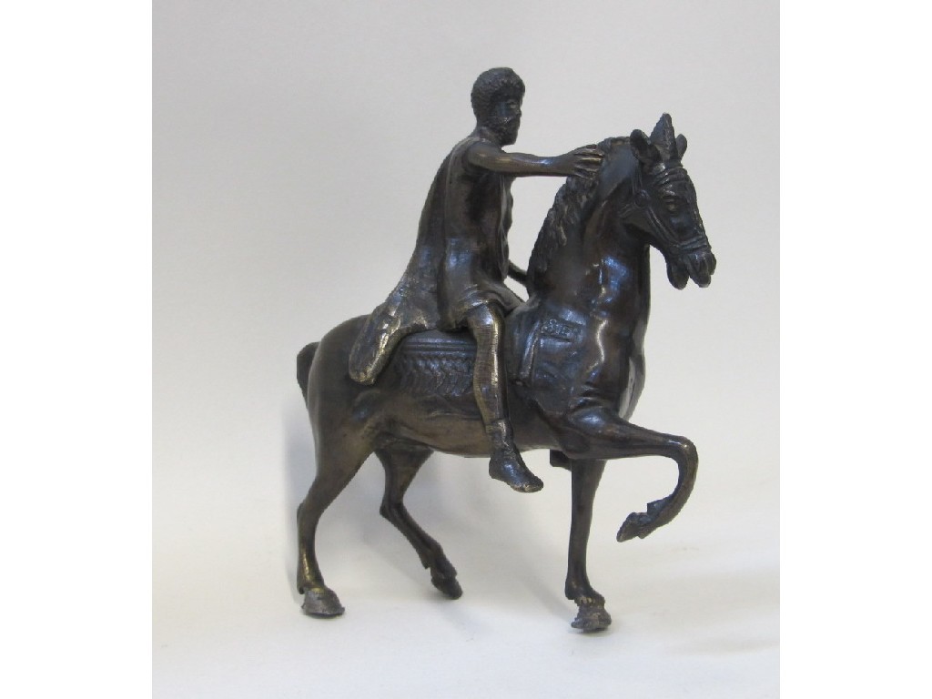 Appraisal: Bronzed metal figure of a man on horseback