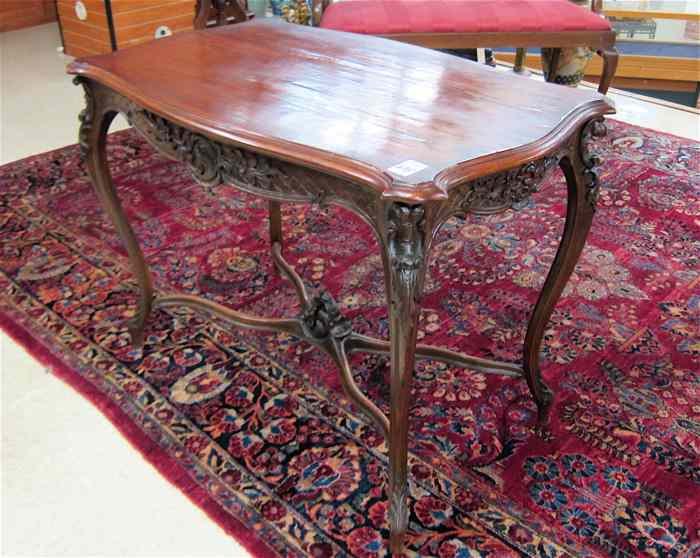 Appraisal: LOUIS XV STYLE CARVED MAHOGANY CENTER TABLE French c having