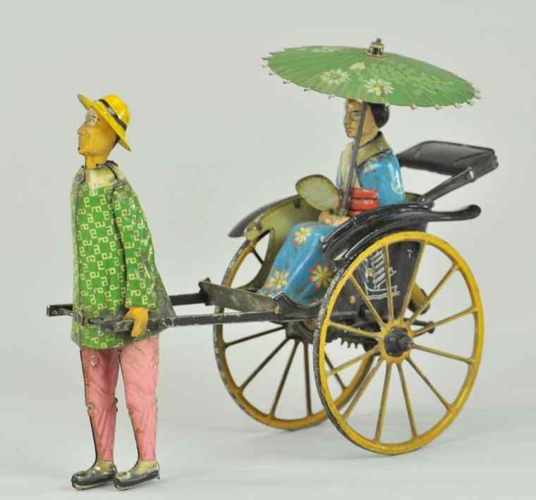 Appraisal: LEHMANN MASUYAMA Germany lithographed and hand painted tin attractive toy