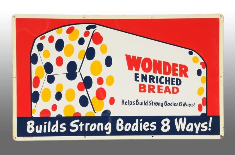 Appraisal: Embossed Tin Wonder Bread Sign Description American Great color loaf