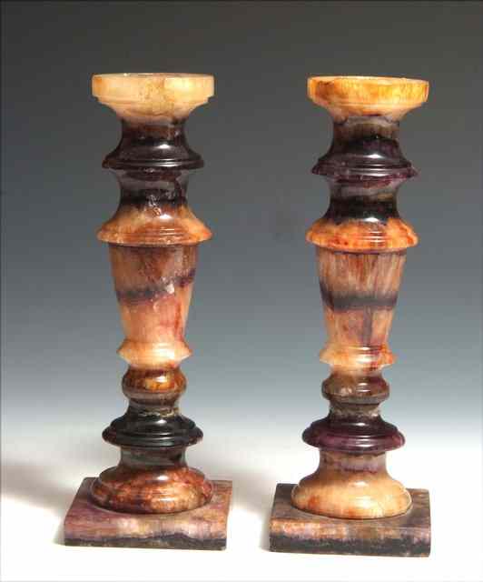 Appraisal: A PAIR OF BLUE JOHN CANDLESTICKS each of turned tapering