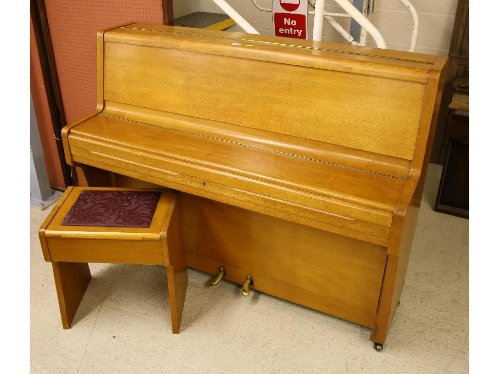 Appraisal: Berry of London light oak upright piano iron frame ser