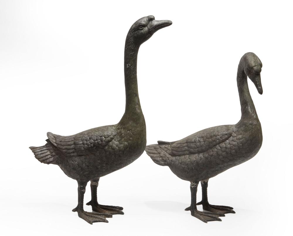 Appraisal: Pair of Patinated Metal Garden Figures of Geese life-size taller