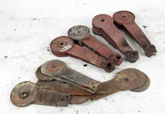 Appraisal: Four Alvis shock absorbers and a quantity of plates for