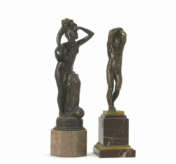 Appraisal: A patinated bronze figure of a young male nude raised