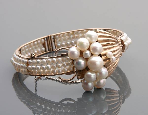 Appraisal: A cultured pearl and k gold bangle with fitted box