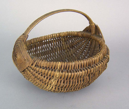 Appraisal: Splint gathering basket with God's eye handle and sweet grass