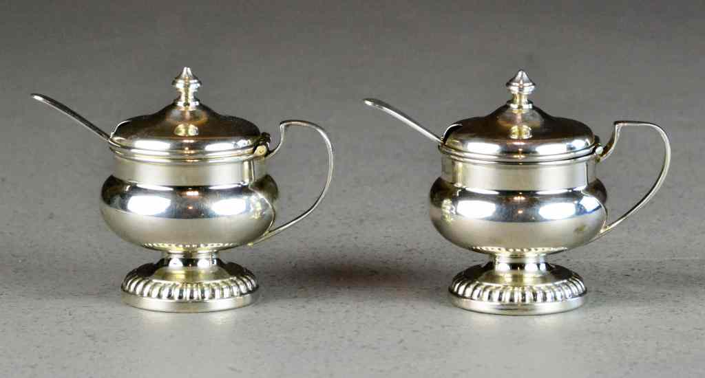 Appraisal: Pair Birks Sterling Mustard Pots and SpoonsEach with beaded footring