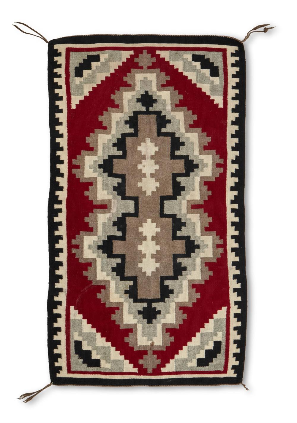 Appraisal: A Navajo regional rug th century Dine Woven in red