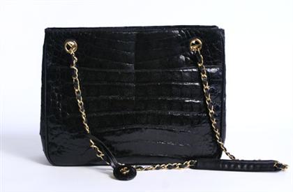 Appraisal: Chanel black alligator purse Simple rectangular design with double chain