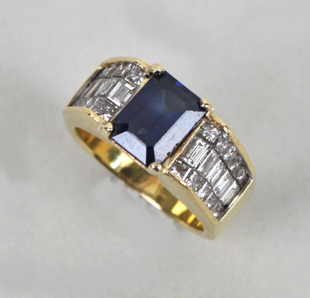 Appraisal: K Gold Sapphire Diamond Ring containing emerald cut round diamonds