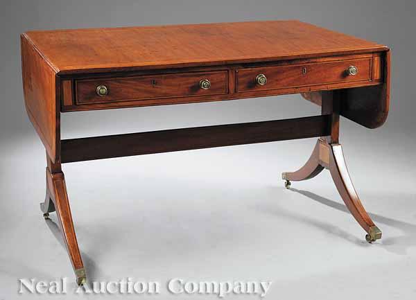 Appraisal: A Regency Inlaid Mahogany Sofa Table th c the banded