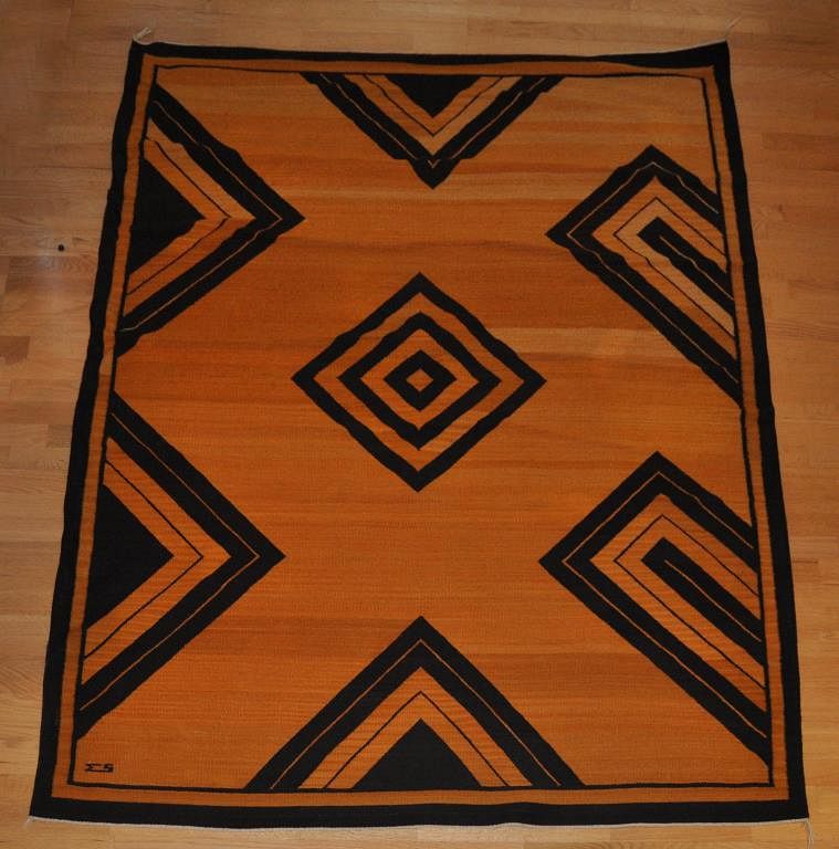 Appraisal: Southwestern Themed Woven Area Rug in striking gold and dark