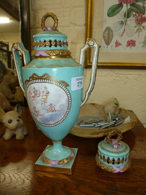 Appraisal: A TURQUOISE GROUND CONTINENTAL PORCELAIN VASE AND COVER decorated with