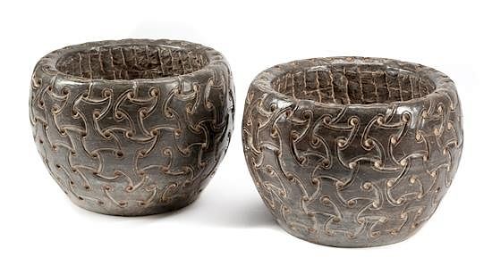 Appraisal: A Pair of Celtic Style Carved Stone Jardinieres Diameter inches