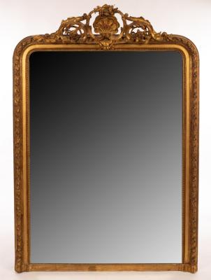 Appraisal: A gilt plaster overmantel mirror with central shell and foliage