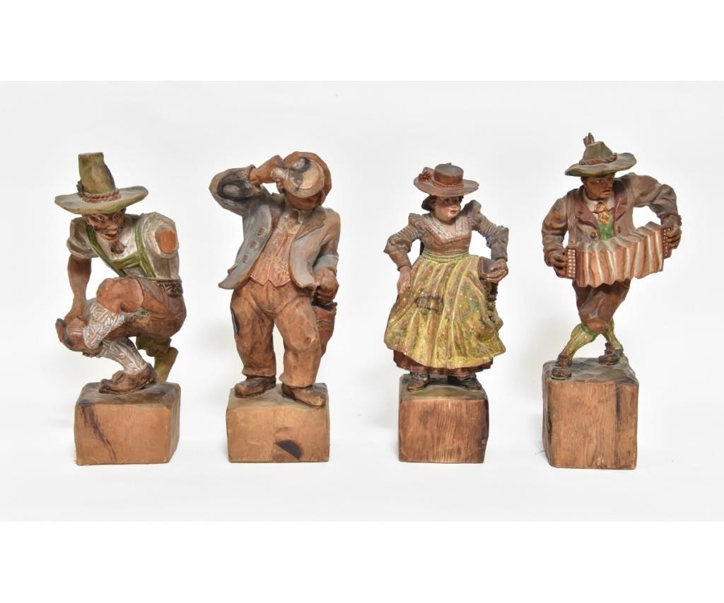 Appraisal: Four carved Austrian beer hall dancers each signed 'Adlhart Hallein