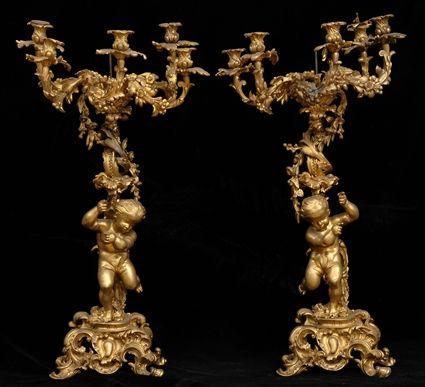 Appraisal: PAIR OF LOUS XV-STYLE GILT BRONZE FIVE-LIGHT FIGURAL CANDELABRA STEMS