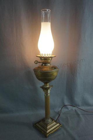 Appraisal: Early 's brass pillar pedestal - candlestick style oil lamp