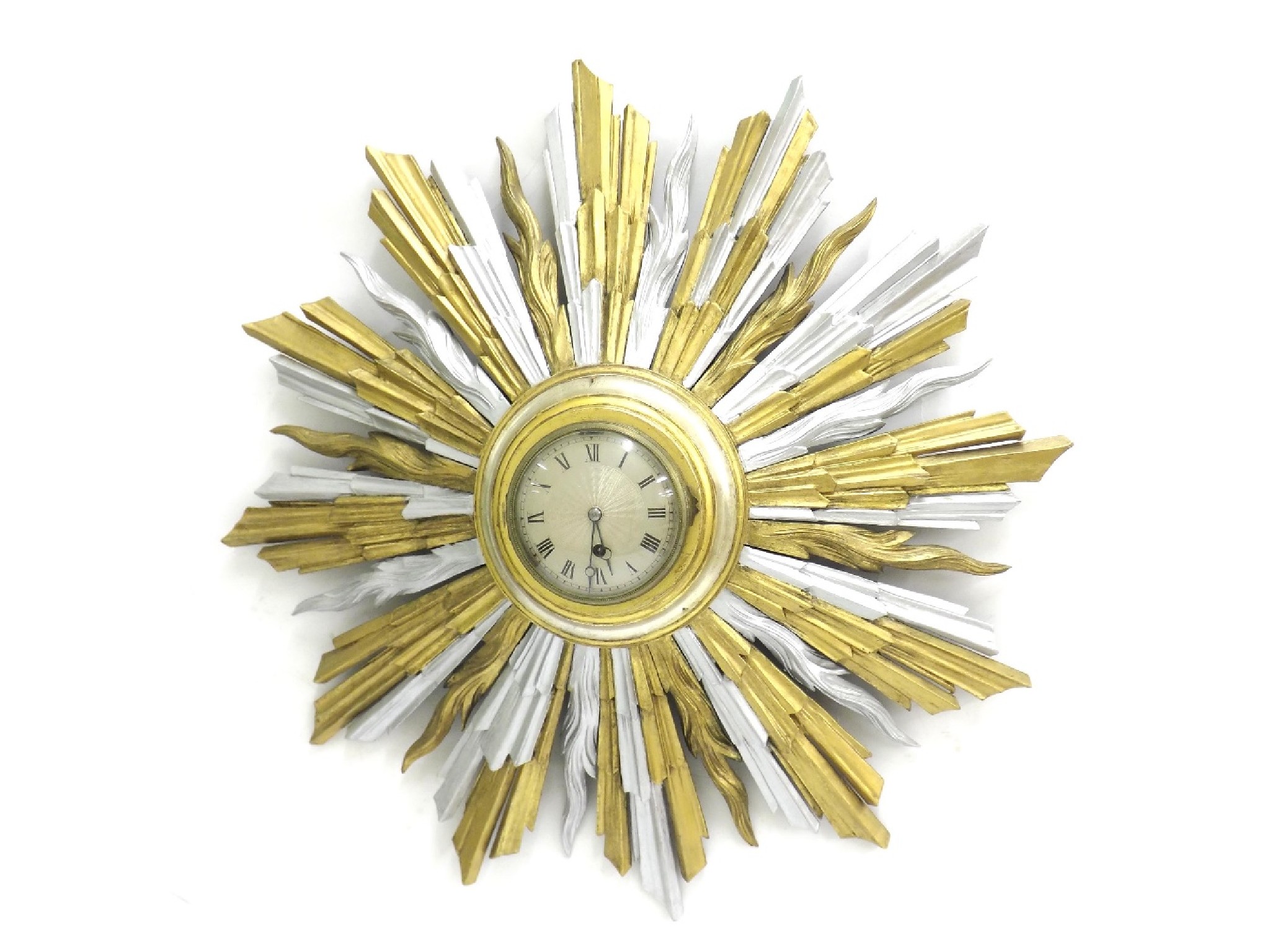 Appraisal: Sunburst wall timepiece the engine turned silvered dial within a