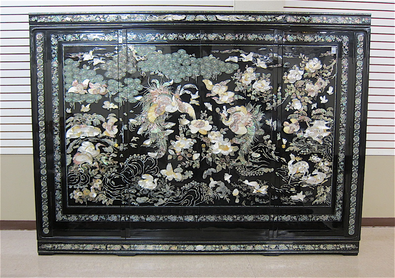 Appraisal: LARGE FOUR DOOR MOTHER-OF-PEARL AND BLACK LACQUER WARDROBE Korean th