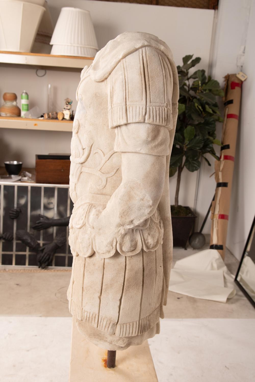 Appraisal: ITALIAN MARBLE TORSO OF AN EMPERORattached to a contemporary marble