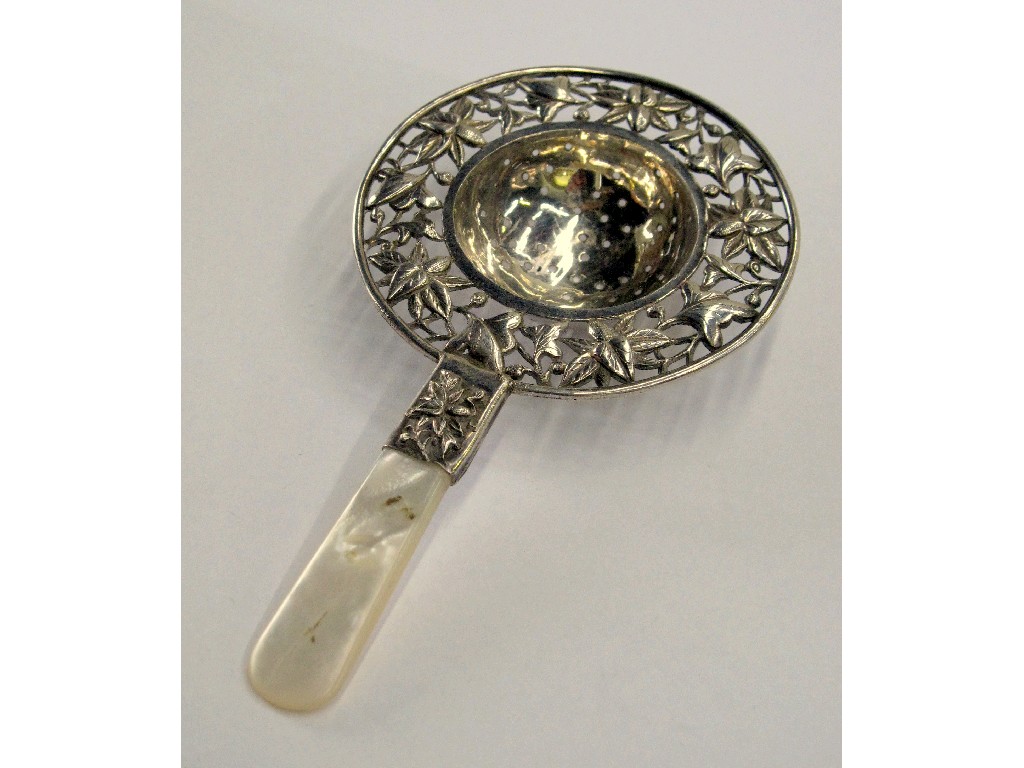 Appraisal: Chinese silver and mother of pearl tea strainer