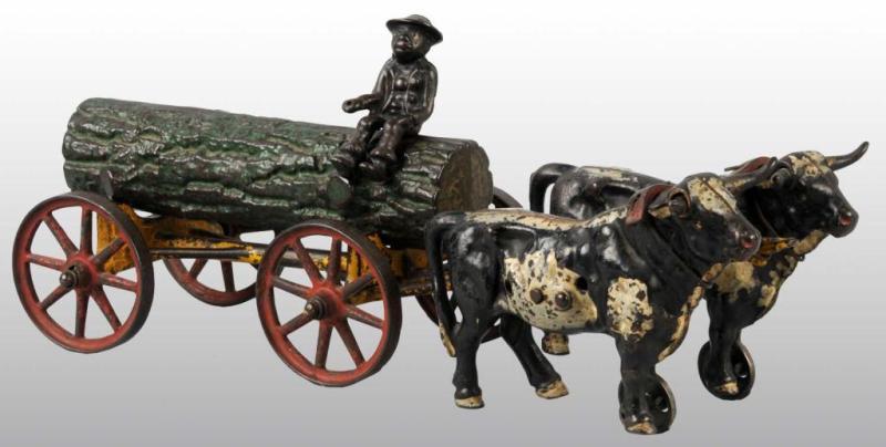 Appraisal: Cast Iron Hubley Ox-Drawn Log Wagon Toy Description Pulled by