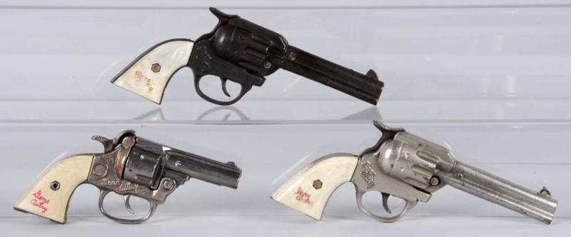 Appraisal: Lot of Cast Iron Gene Autry Cap Guns Description The