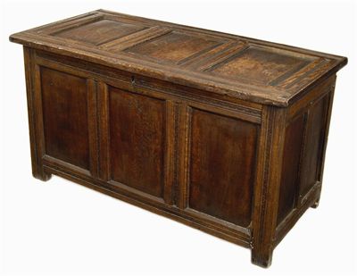 Appraisal: An early th century panelled oak chest the front panel