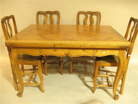 Appraisal: FRENCH PROVINCIAL STYLE DINING TABLE AND CHAIRS Comprising table and