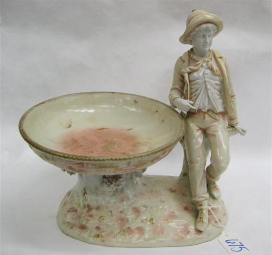 Appraisal: GERMAN RW RUDOLSTADT FIGURAL POTTERY COMPOTE depicting a boy sitting