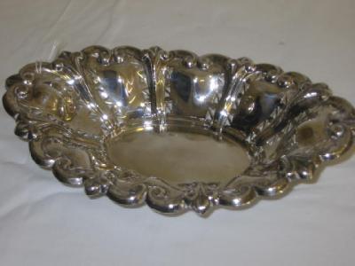 Appraisal: AN EDWARDIAN FRUIT BASKET of lobed oval form the pierced