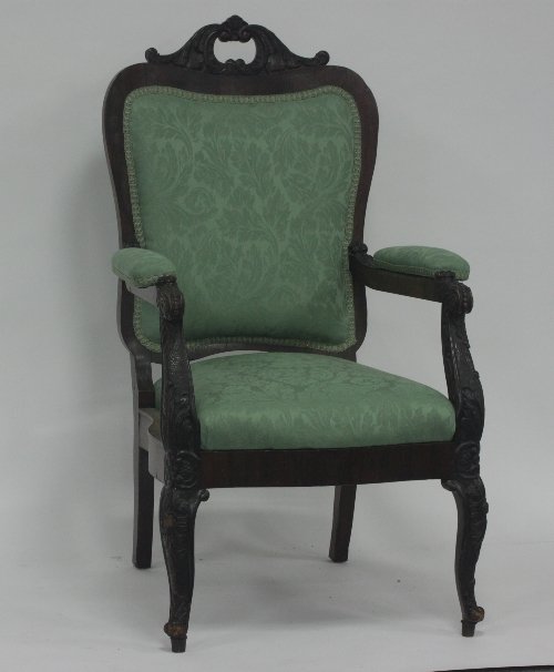 Appraisal: A Polish th Century rosewood open armchair with padded back