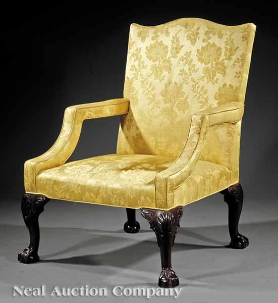 Appraisal: A George III Carved Mahogany Library Armchair c arched crest