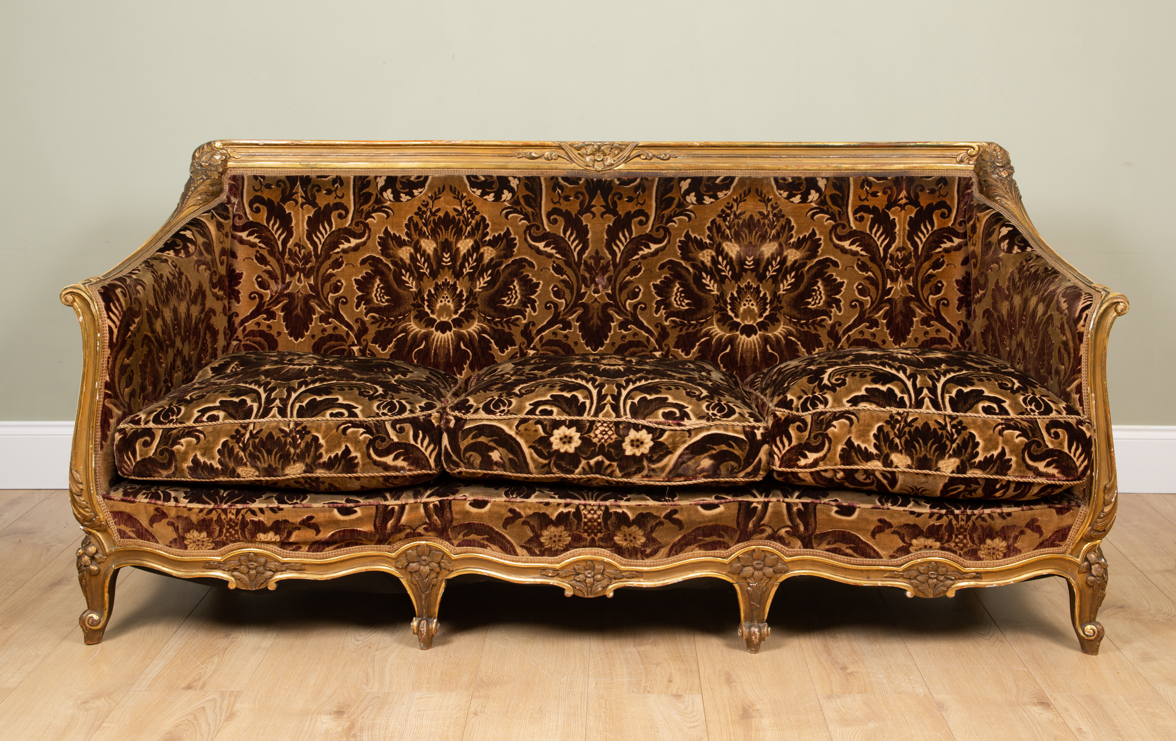 Appraisal: An early to mid th century giltwood sofa in the