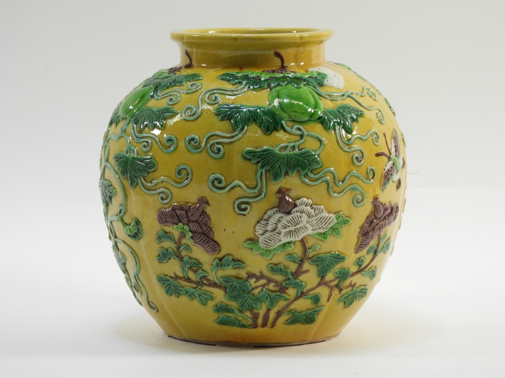 Appraisal: CHINESE QING SANCAI FRUIT FLORAL VASE China Circa Squat yellow