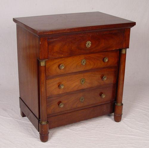 Appraisal: BAKER EMPIRE STYLE CHEST Overhanging top drawer over three drawers