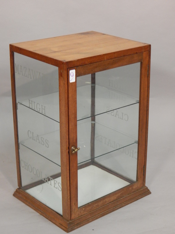 Appraisal: A late th early thC glazed mahogany shop display cabinet