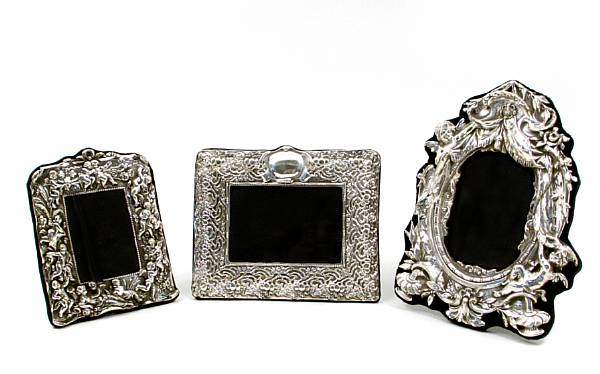 Appraisal: A group of three sterling faced photo frames after the