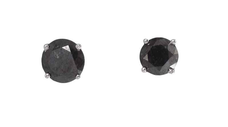 Appraisal: NATURAL BLACK DIAMOND SOLITAIRE STUD EARRINGS k white gold stud