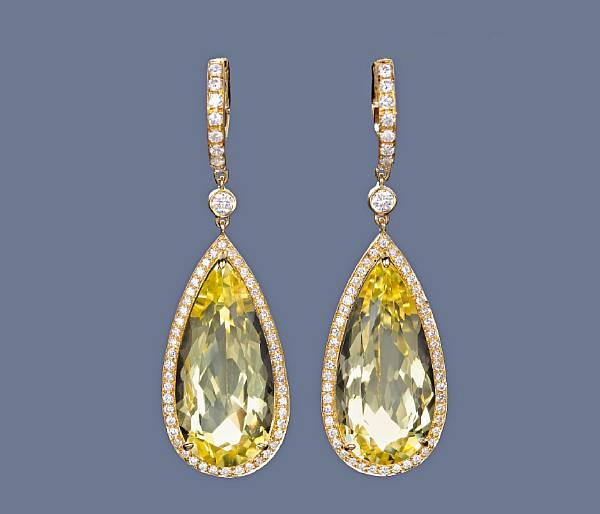 Appraisal: A pair of yellow quartz earrings estimated total quartz weight