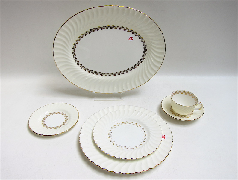 Appraisal: MINTON CHINA SET ninety-eight pieces in the Chevoit Gold pattern