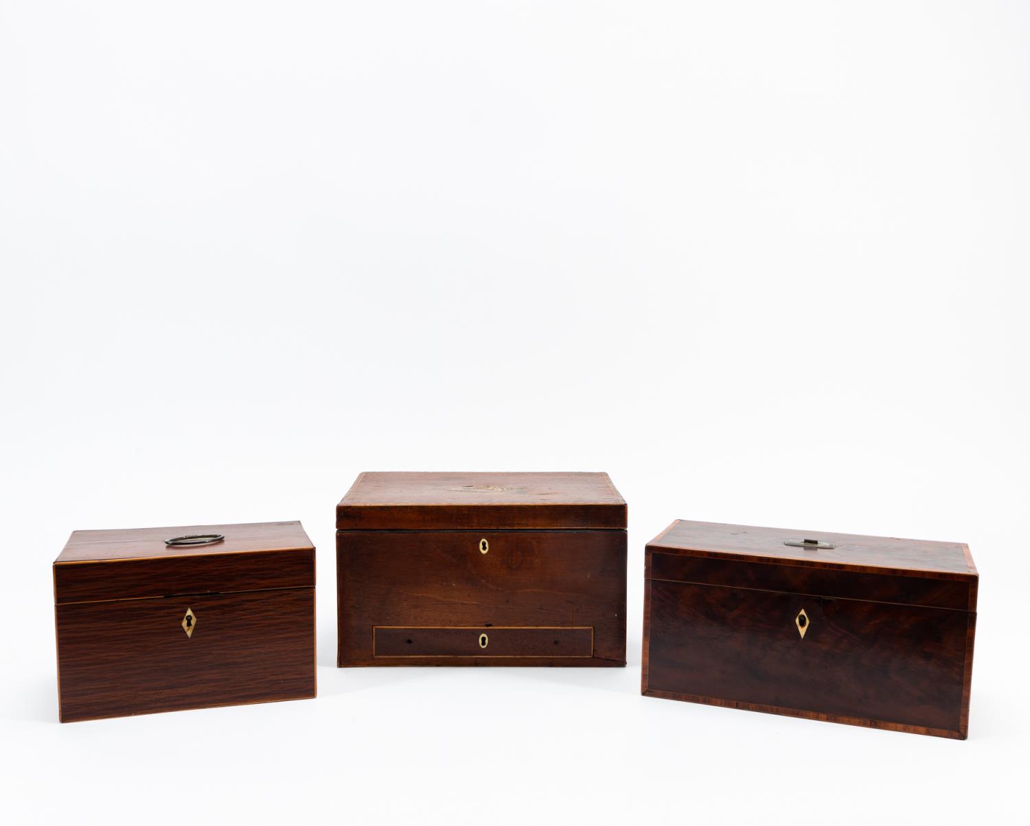 Appraisal: THREE TH C MAHOGANY TEA CADDIES English th century three