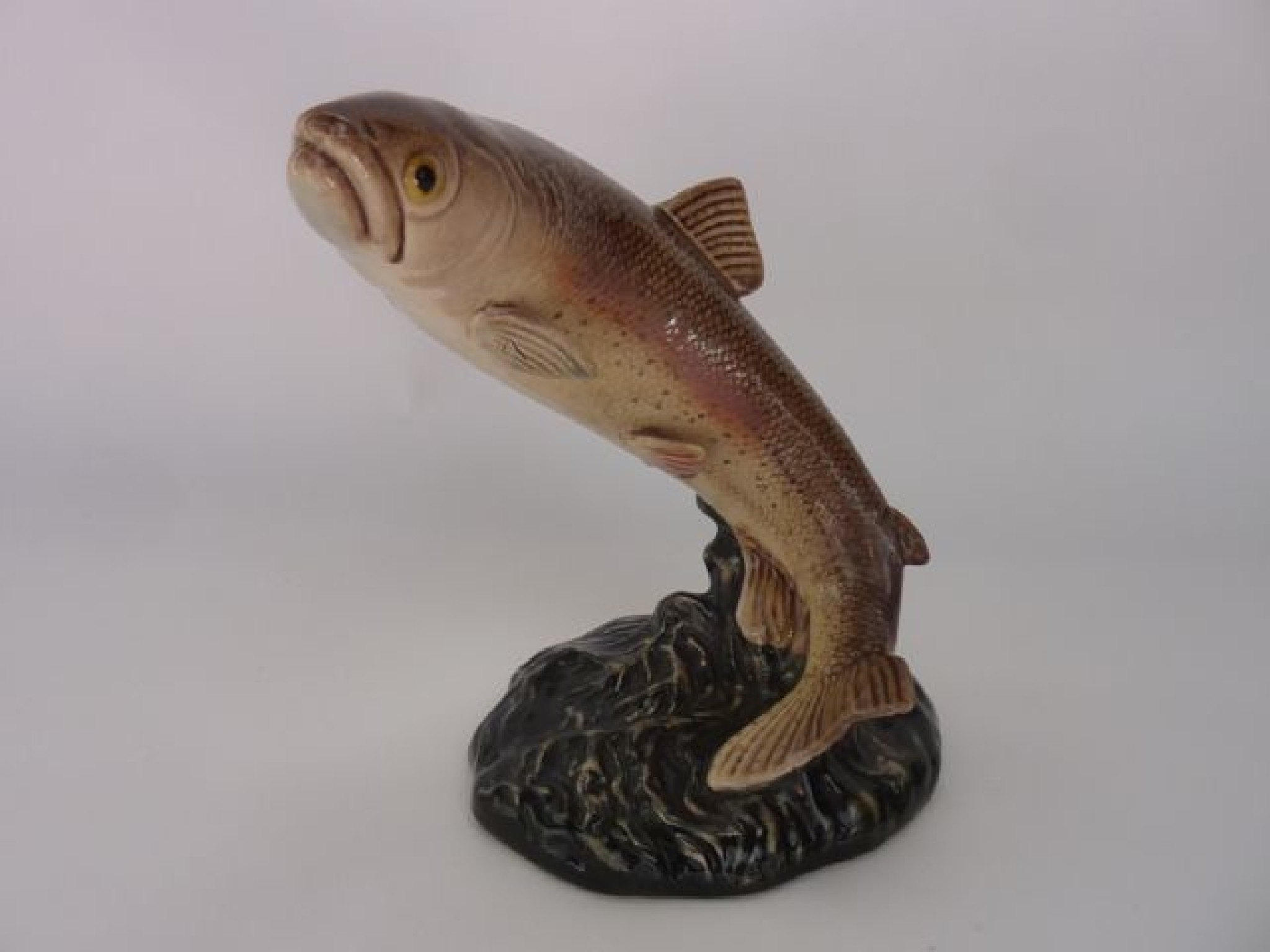 Appraisal: A Beswick model of a leaping trout with impressed and