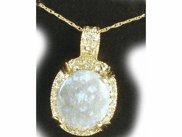 Appraisal: Stunning karat yellow gold ladies pendant set with a center