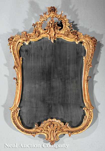 Appraisal: An Antique American Rococo Carved Giltwood Looking Glass late th