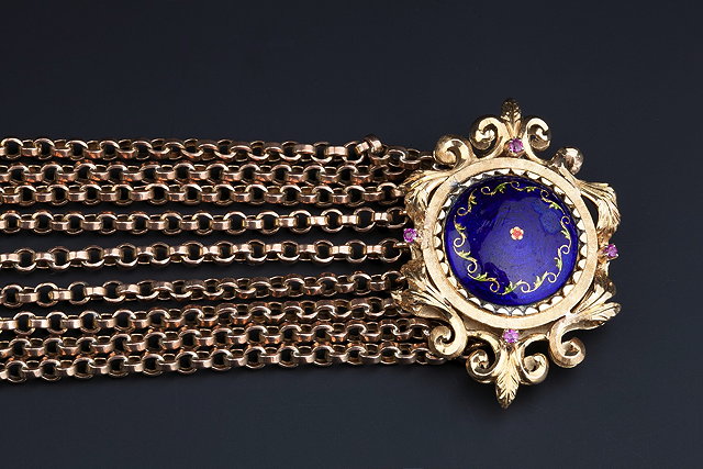 Appraisal: A MULTI-STRAND BRACELET WITH ENAMEL AND GEM SET CLASP the