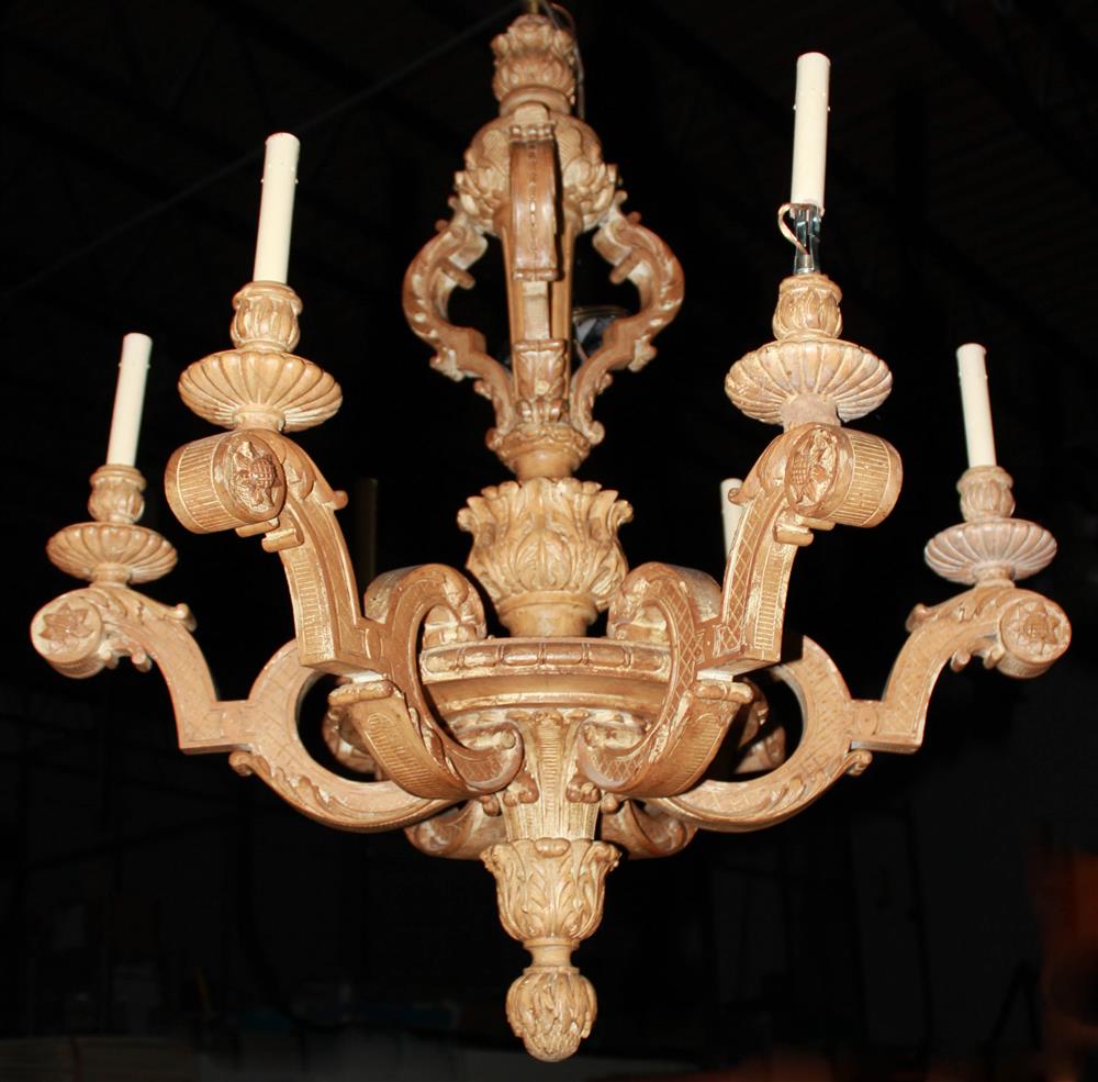 Appraisal: REGENCE STYLE CARVED WOOD SIX LIGHT CHANDELIER with foliate candleholders